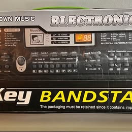 61-Key Electronic Keyboard - Musical Information System with Built-in Speakers & Stand