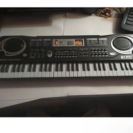61-Key Electronic Keyboard - Musical Information System with Built-in Speakers & Stand