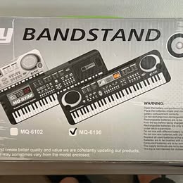 61-Key Electronic Keyboard - Musical Information System with Built-in Speakers & Stand